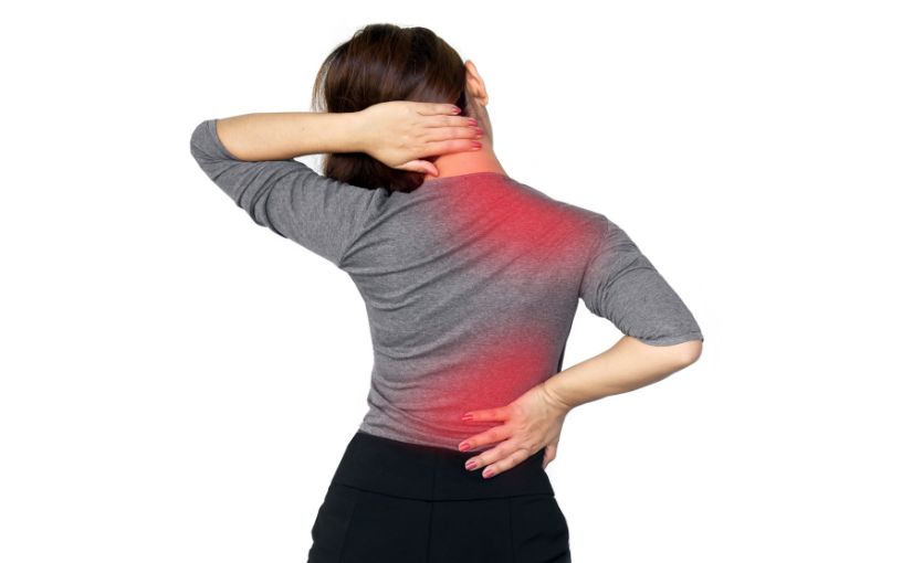 Woman on gray shirt with muscle spasm.