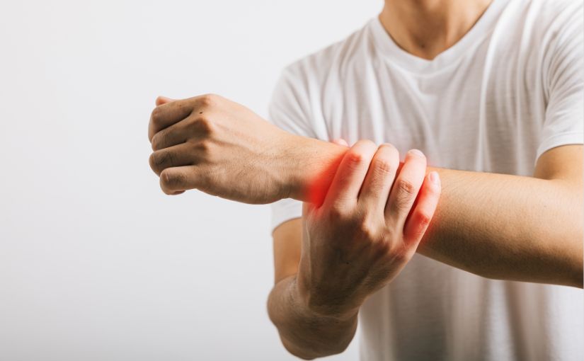 person experiencing wrist pain