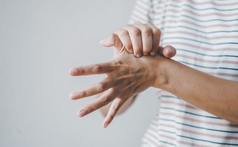 person with hand and finger pain