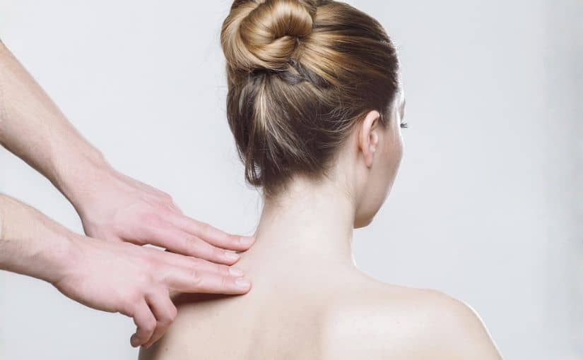 Person getting neck massage because of neck pain and discomfort