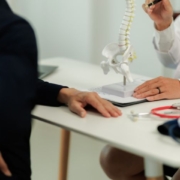 Patient talking to chiro doctor