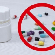 Medication with prohibition sign, suggesting drug-free
