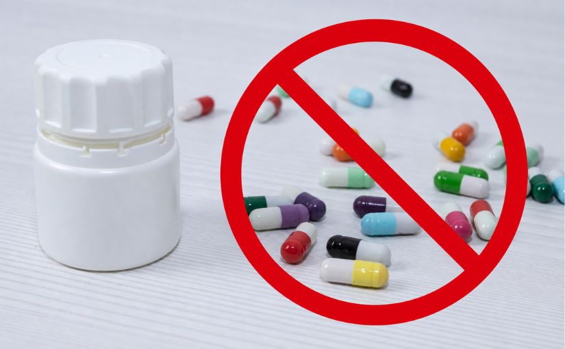Medication with prohibition sign, suggesting drug-free