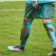 football player walking on grass
